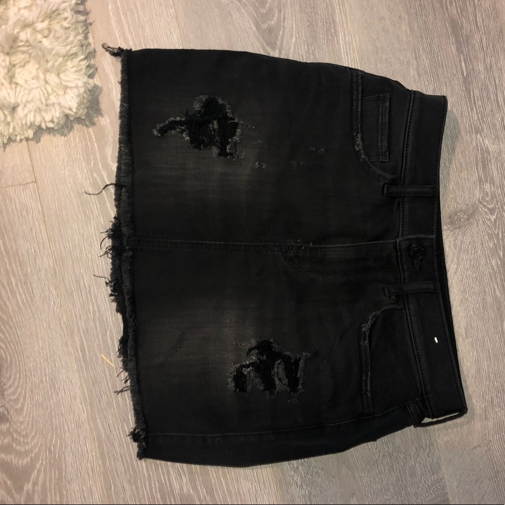 Black distressed jean skirt